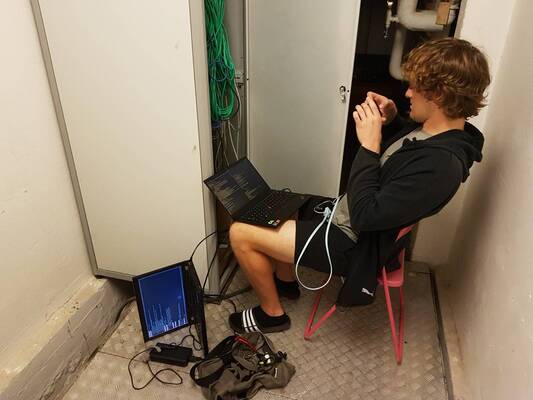 Me working in a server room at ABK-Net.